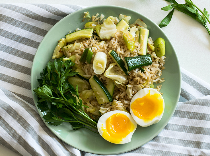 rice-with-zucchini-soft-boiled-egg-and-parsley-in-green-1410235